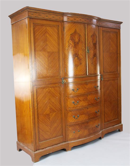 An Edwardian marquetry inlaid satinwood breakfront wardrobe, W.7ft D.2ft 6in. H.7ft 2in.